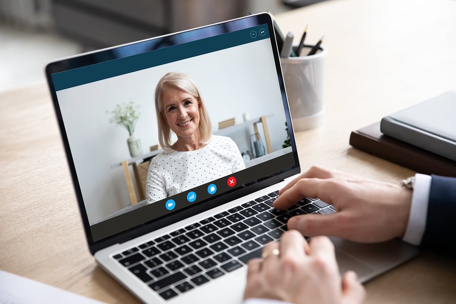 bigstock-Old-Woman-Holding-Video-Call-W-357909314